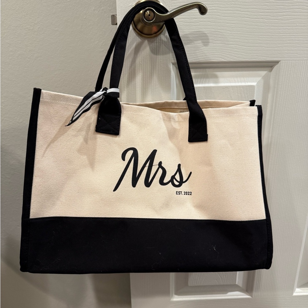 Chic Black and Cream Canvas Tote with Stylish Accents